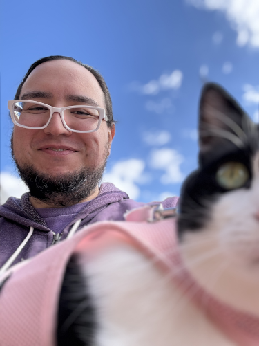 Me holding my cat.